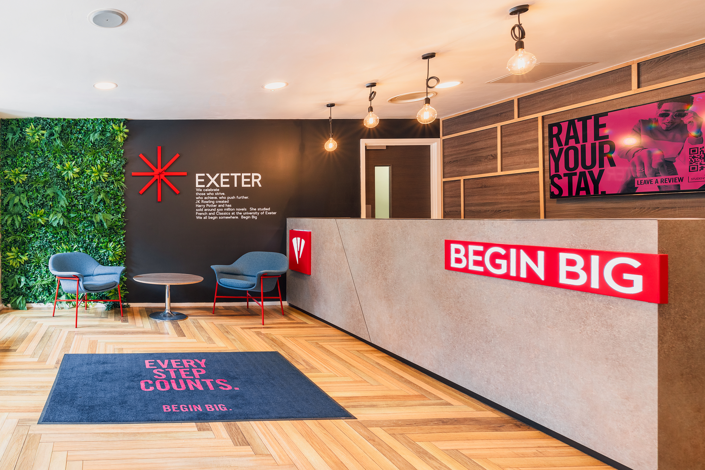 A reception desk in Portland House welcomes visitors with modern style and professionalism.