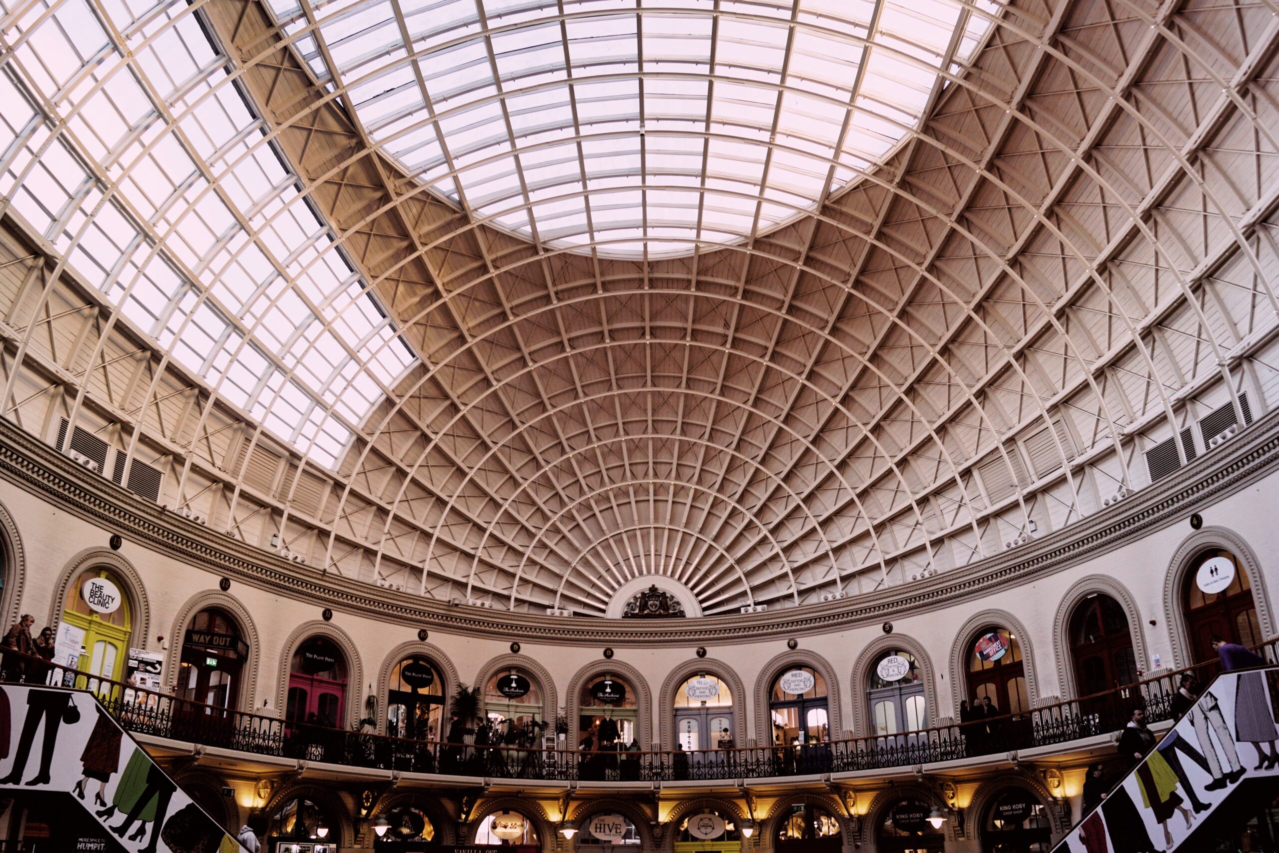 The ceiling of a grand old building in the shape on an octagon