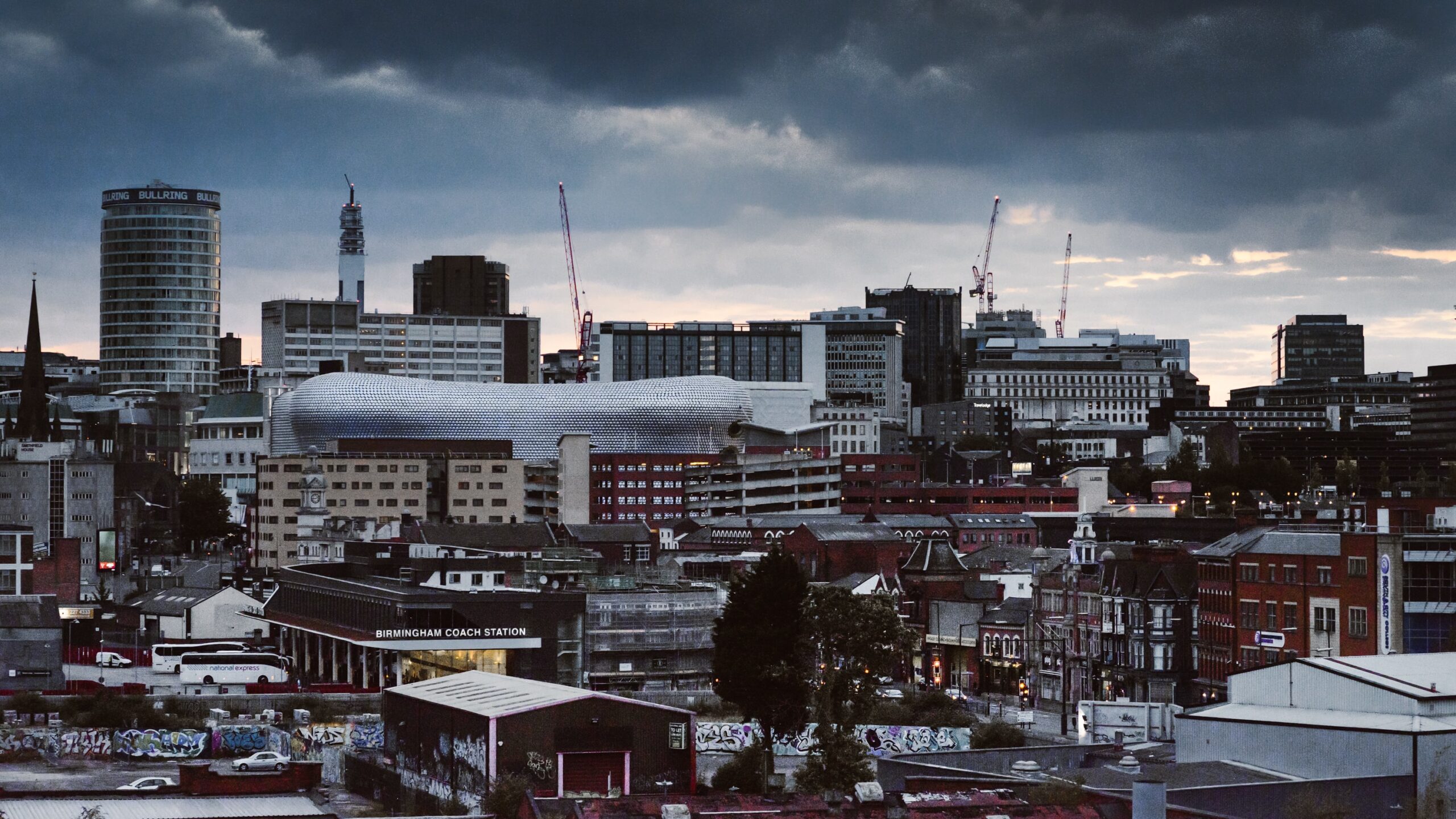 A cloudy sky over a city.