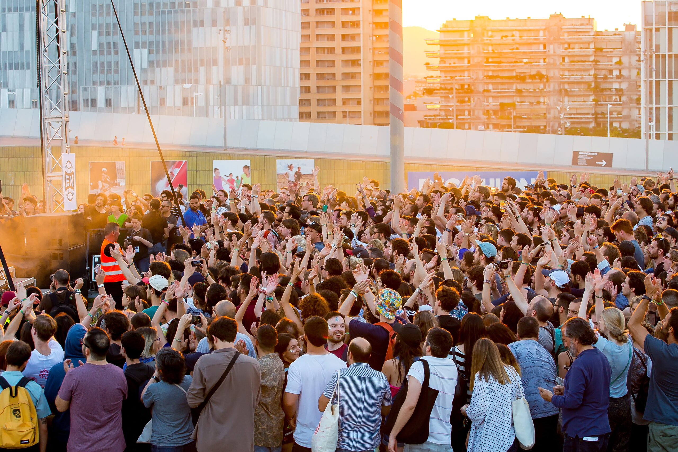 A crowd of people at a festival.