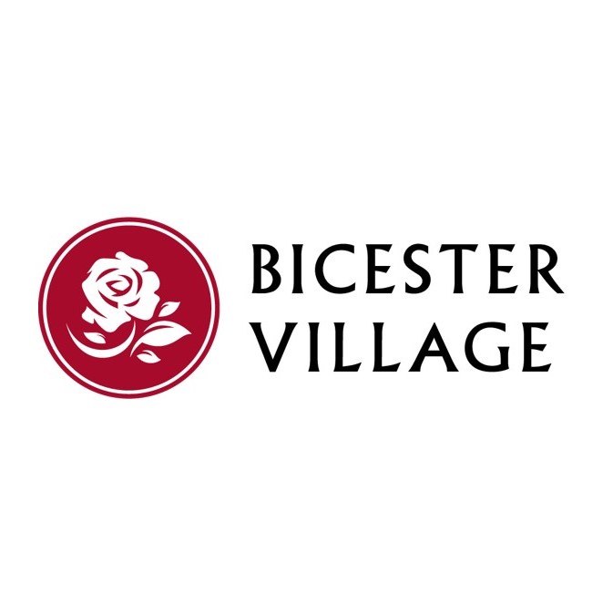 The logo of Bicester Village, part of the Vita Student brand partners, features a stylized white rose inside a red circle on the left, with the text "Bicester Village" in black against a pristine white background.