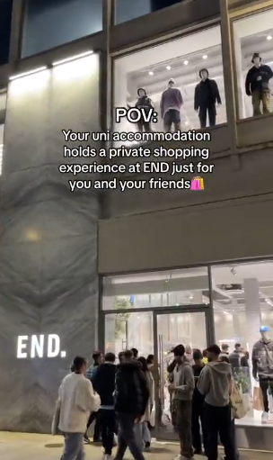 Storefront of END. with people gathered outside. Mannequins are displayed in the upper windows. Text on image reads: "POV: Your uni accommodation holds a private shopping experience at END just for you and your friends.