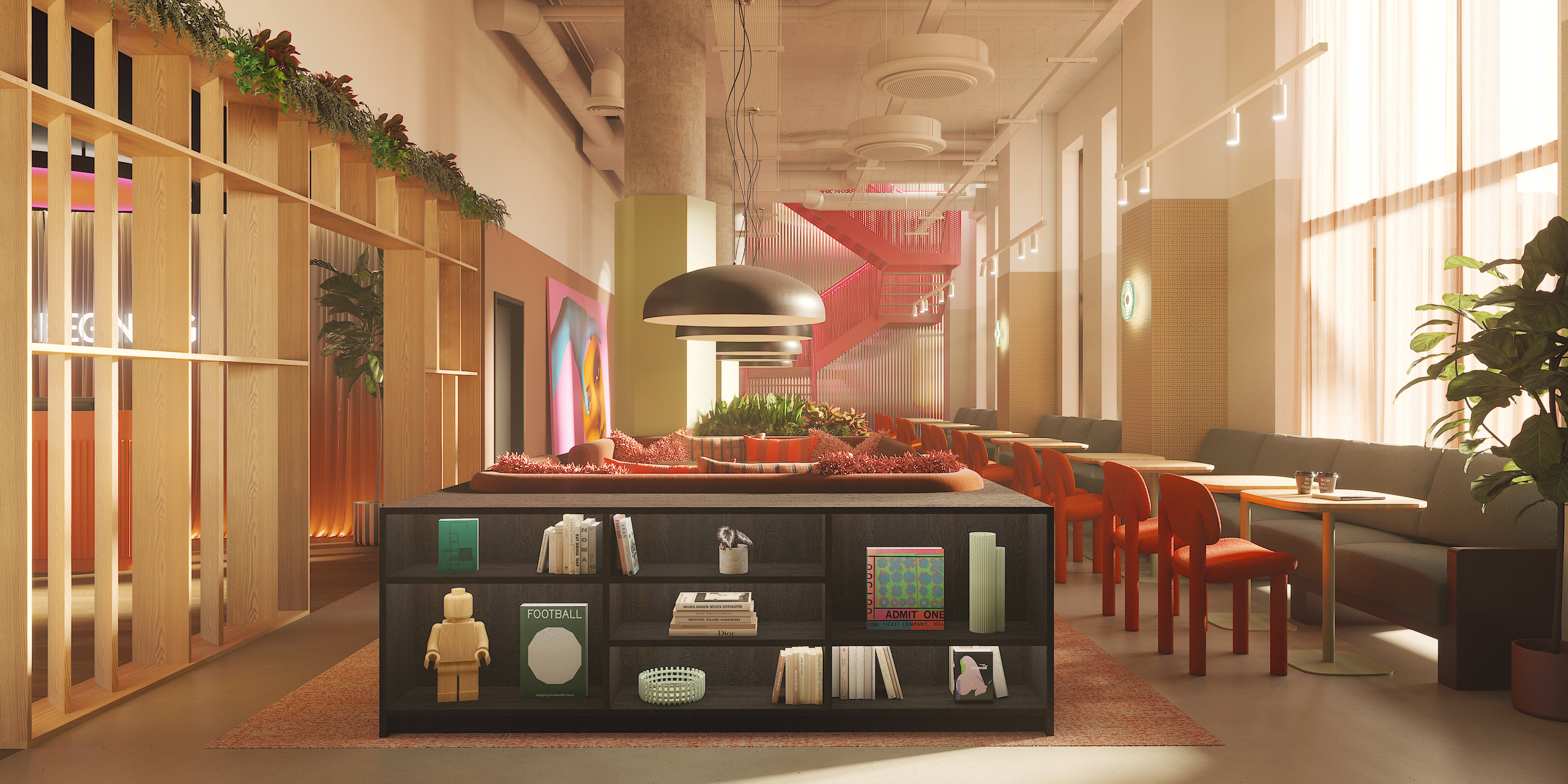 A modern, stylish lounge with a central bookshelf, green plants, red chairs, booths along the wall, large windows, and a red staircase in the background. Natural light fills the spacious, contemporary interior.