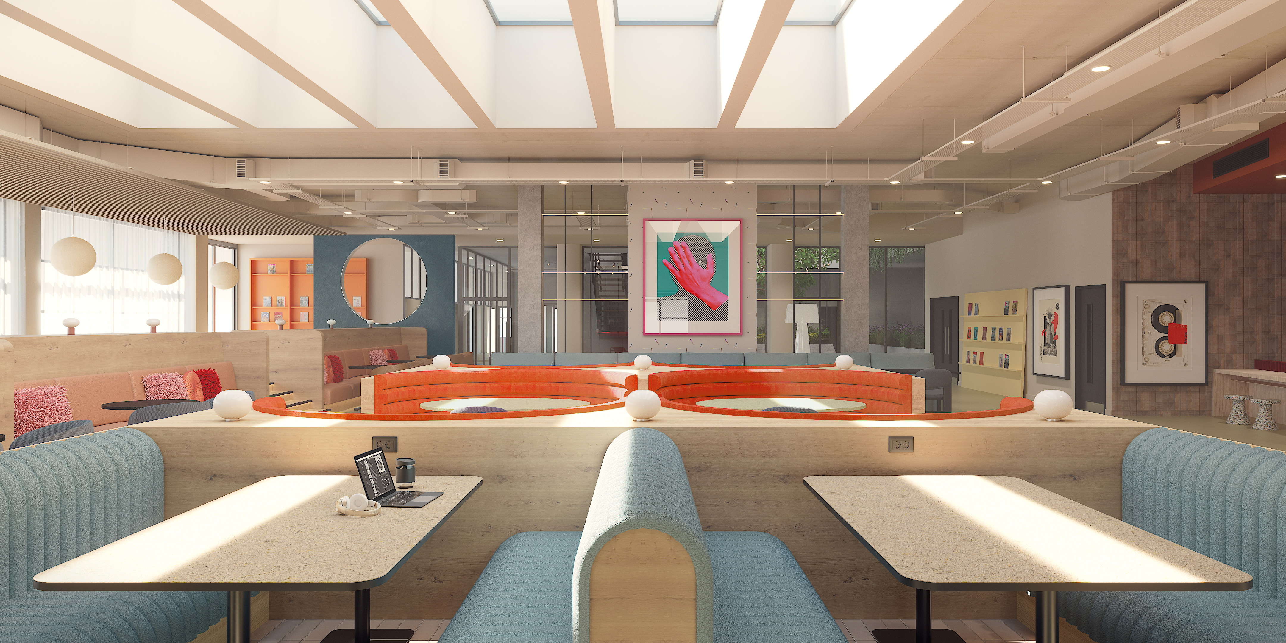A modern cafe with light blue and orange booths, round white lamps, and large windows letting in natural light. Colorful artwork decorates the walls, and a laptop sits on one of the tables in the foreground.