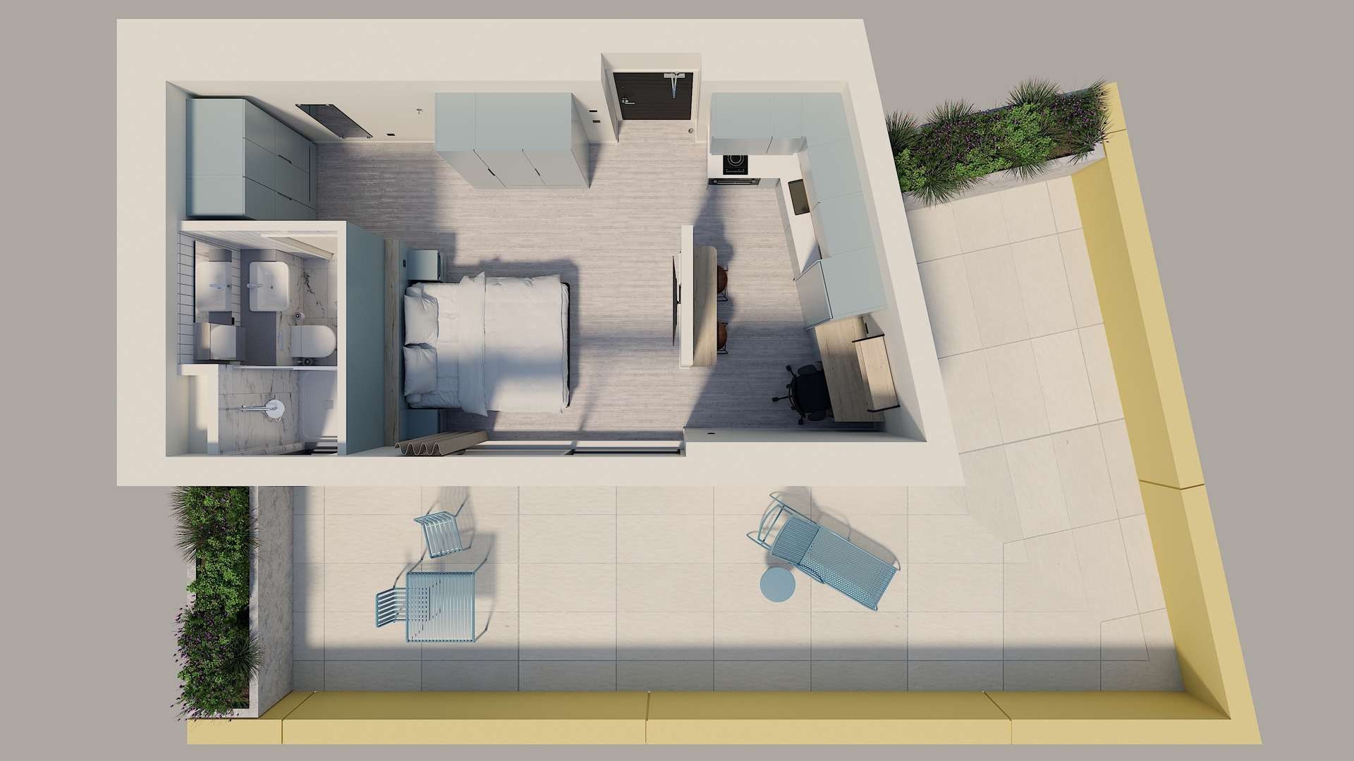 Top-down view of a modern studio apartment with a bed, desk, wardrobe, bathroom, and large outdoor patio with lounge chairs, a table, and plants along the edges. Light color scheme and minimalist furnishings.