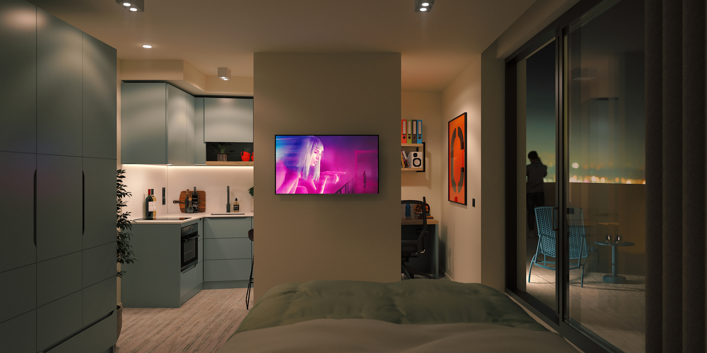 A modern studio apartment with a bed, a TV on the wall showing a woman, a compact kitchen on the left, a small desk area, and sliding glass doors opening to a balcony at night.