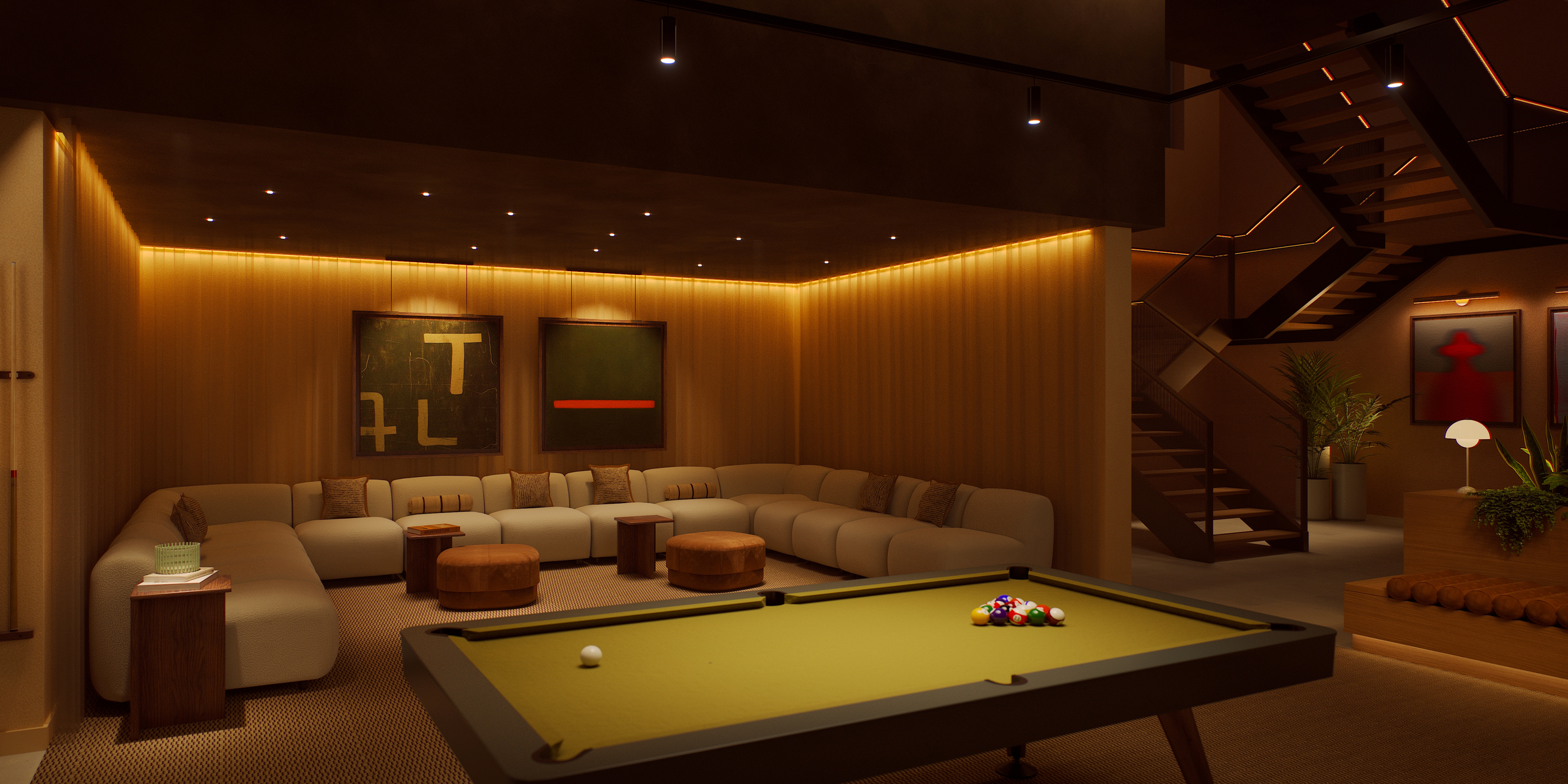 A modern lounge on India Street with a pool table, large sectional sofa, abstract wall art, wooden accents, and warm ambient lighting. Stairs and indoor plants are visible in the background.